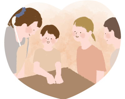 笑顔の子供たちと先生